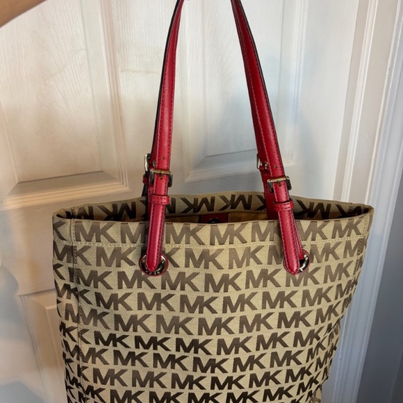 Michael Kors Handbags - Michael Kors Beige MK Canvas Tote with Red Leather Handles
